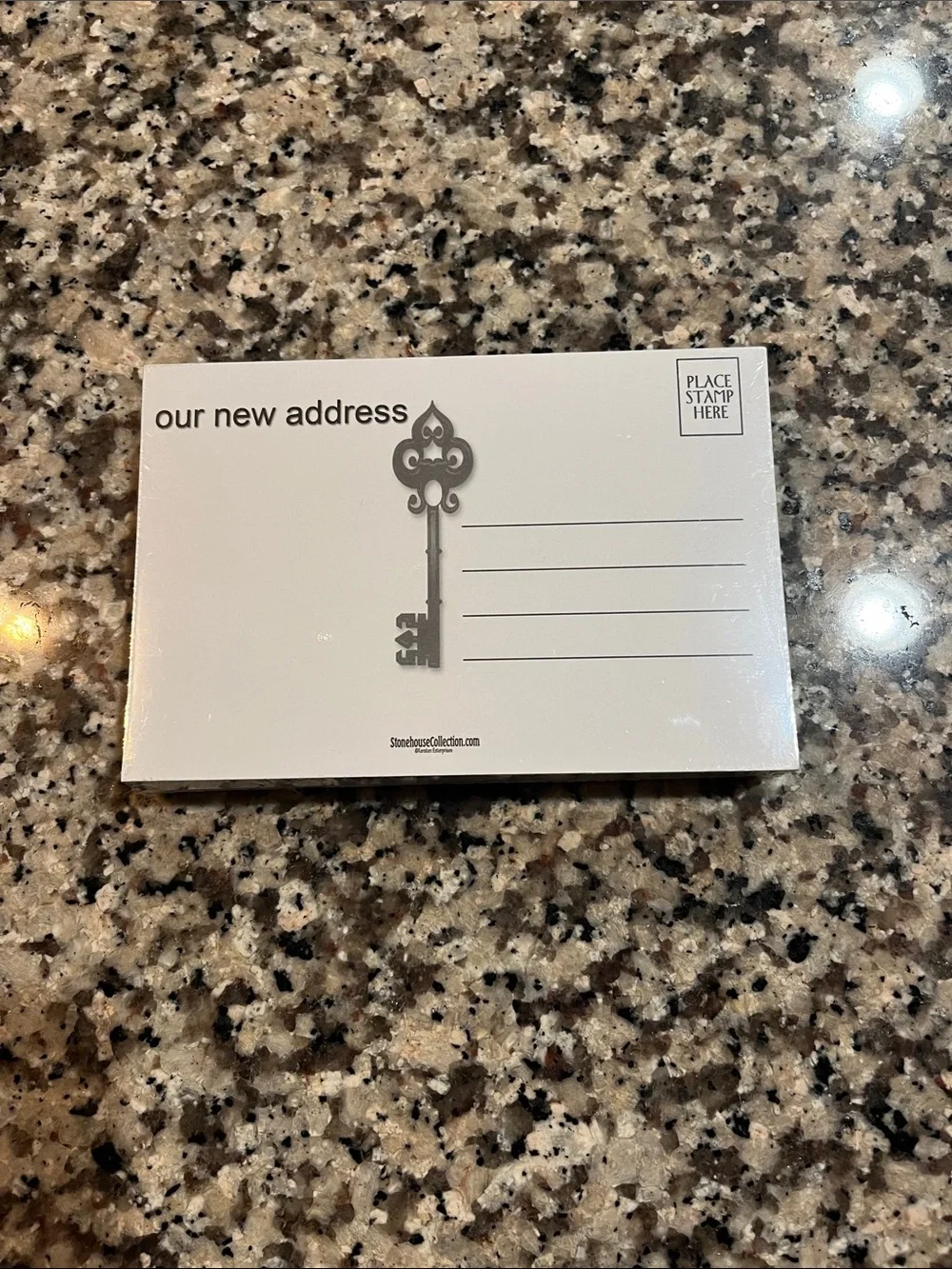 BRAND NEW - We've Moved! Pink & Orange Key Postcards, one pack of 50 cards